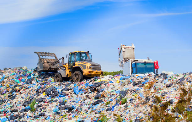 garbage truck unloading at a landfill garbage truck unloading at a landfill